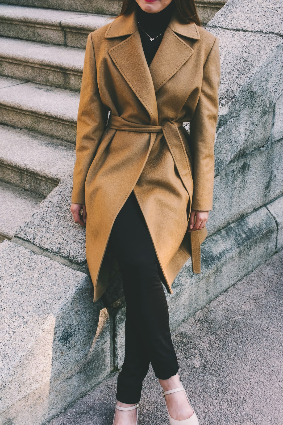 Wool-blend overcoat hanging in apparel display